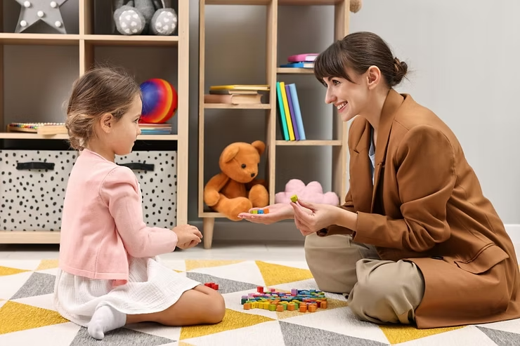 ABA Therapist with a kid