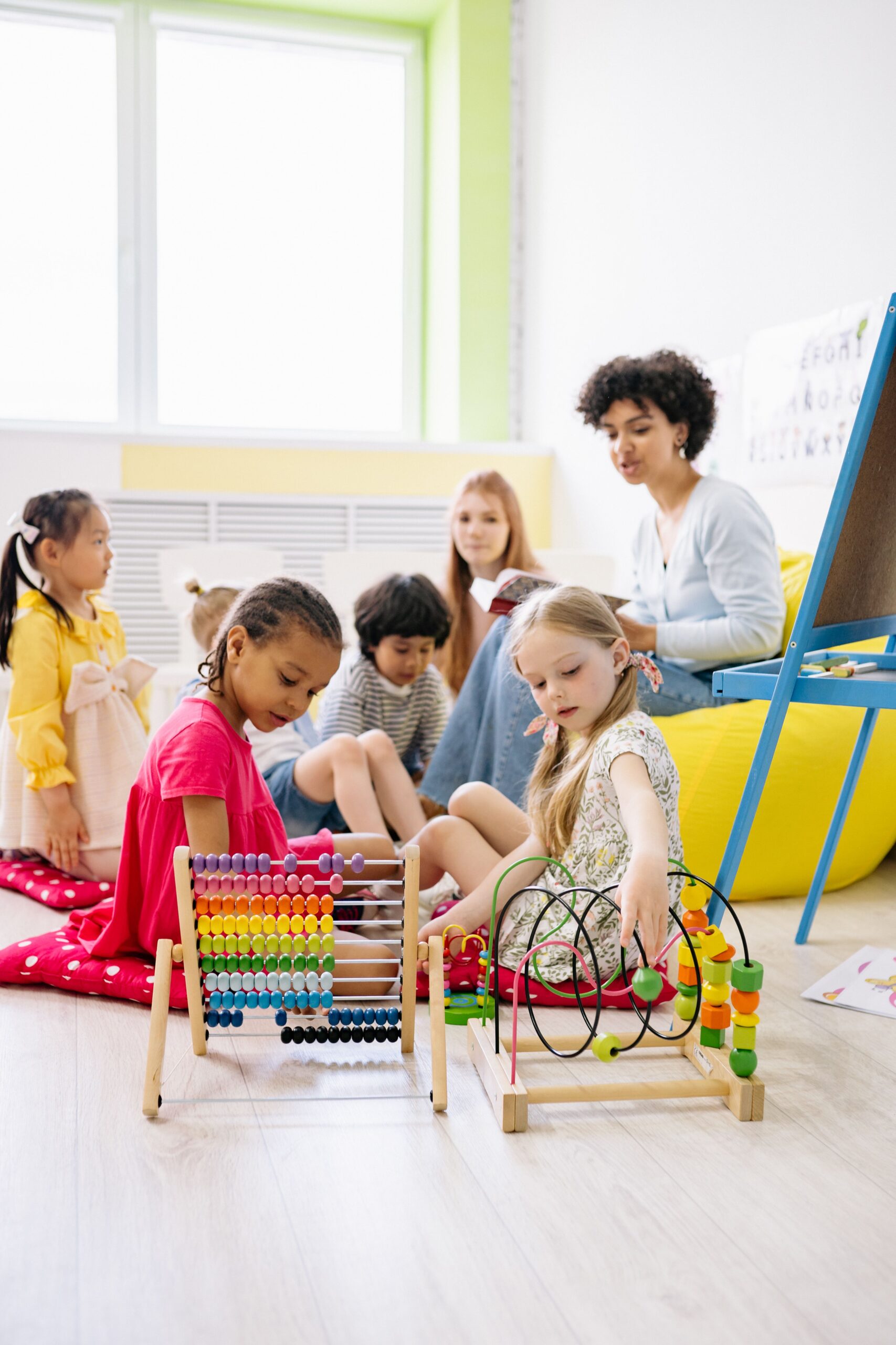 Children and an adult taking part in a classroom activity